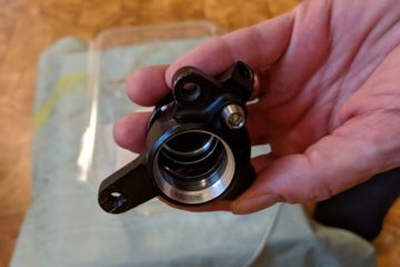 Echo TR disc brake caliper with bore cap and pistons removed