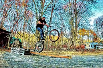 Dropping from a stack of pallets onto a skinny on my trials bike