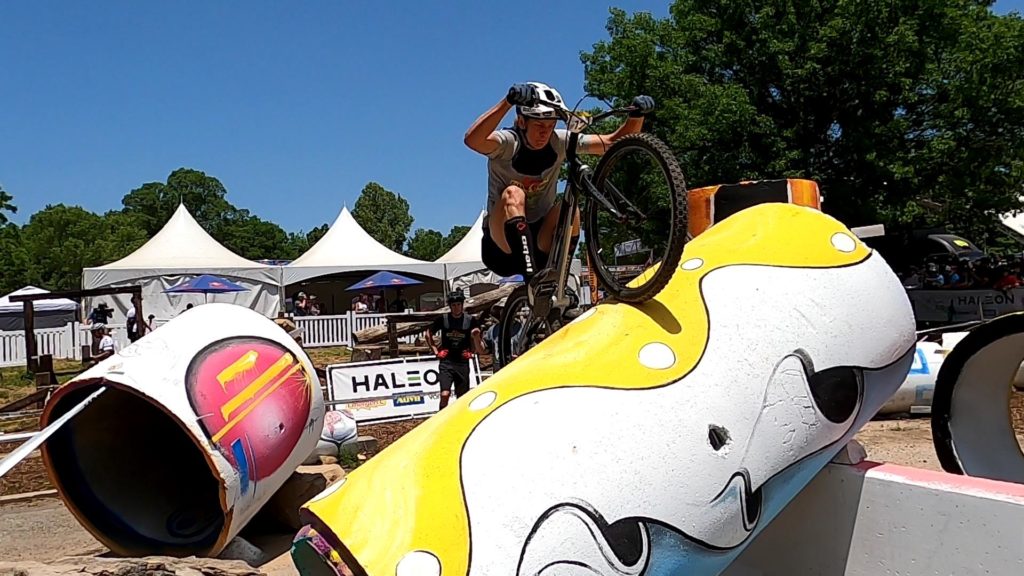 Sean Farrar hops his trials bike onto a concrete pipe