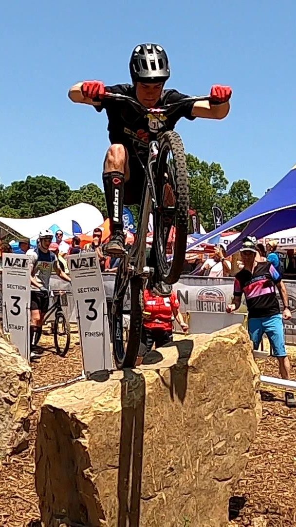 Ian Farrar hops up to rear wheel onto a narrow rock