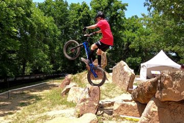 Grant Memmott prepares to drop off a rock on his trials bike