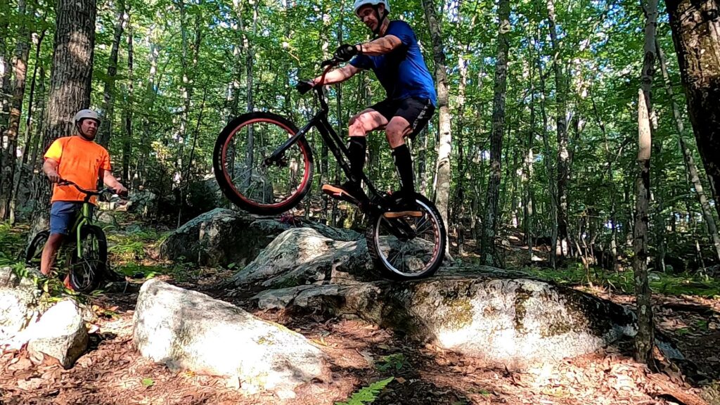 Tim prepares to gap between rocks on his trials bike