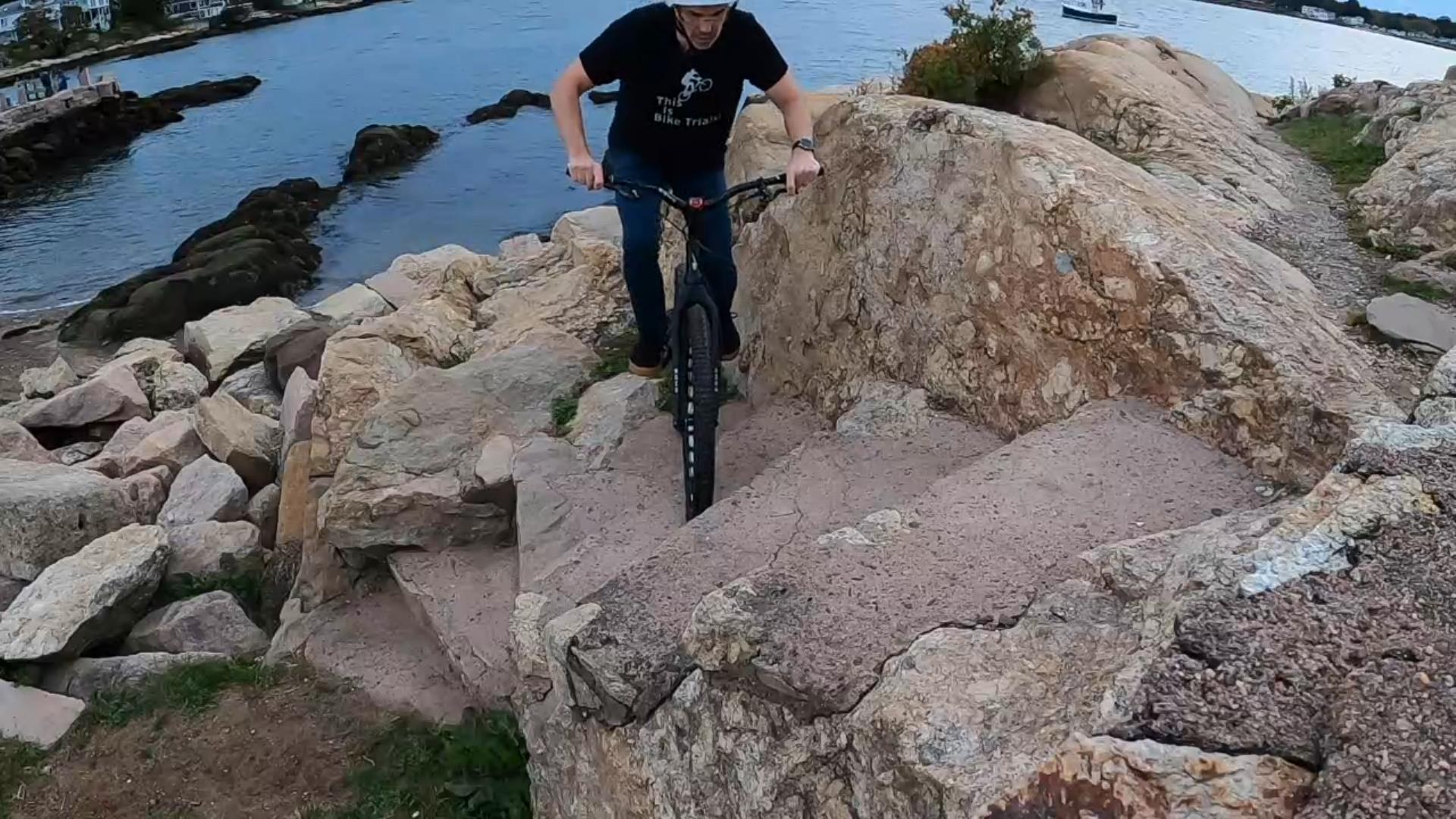 Climbing stone stairs on a bike