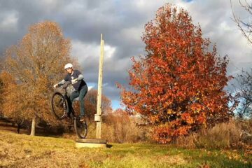 Dropping off a concrete well cover on my trials bike