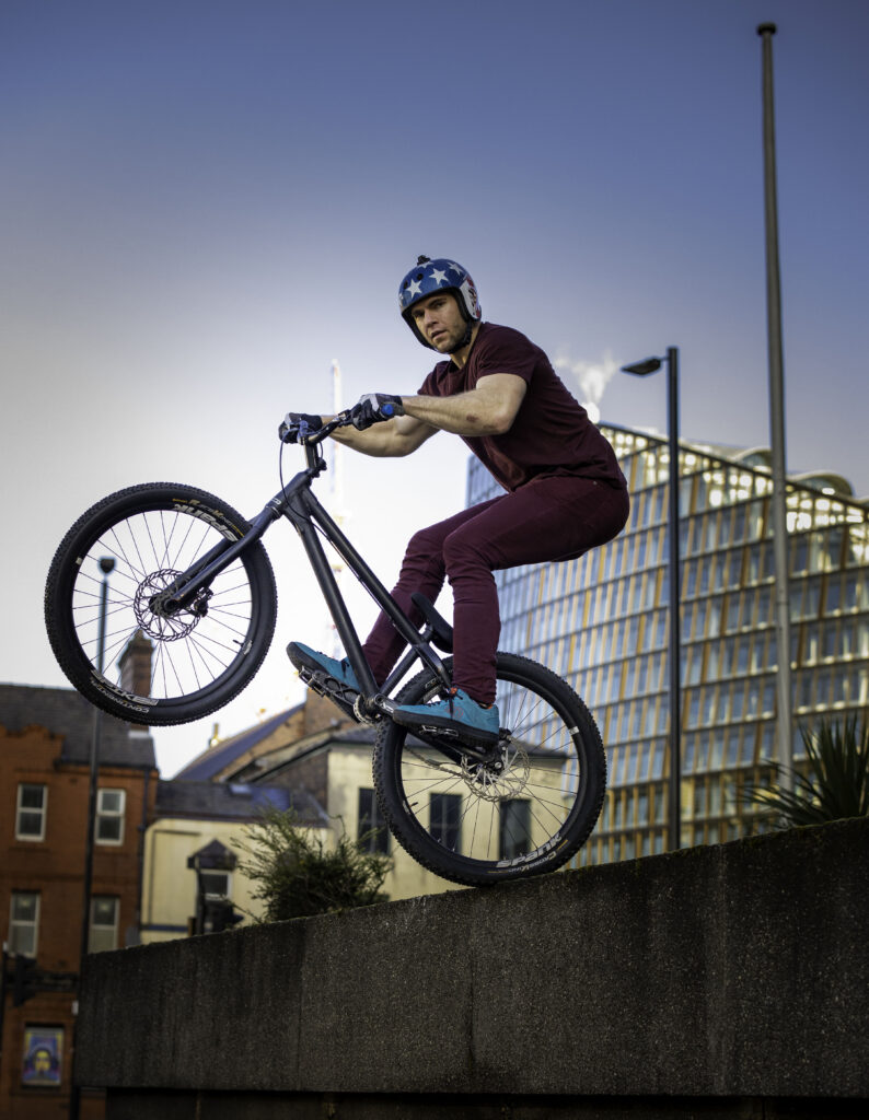 Drew "Big Hops" Fortner doing a rear wheel drop from a wall