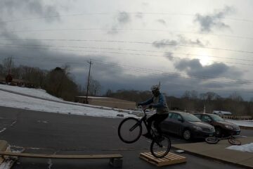 Tony hopping on the rear wheel of his trials bike